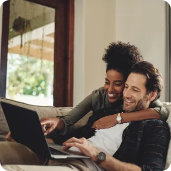 couple watching laptop
